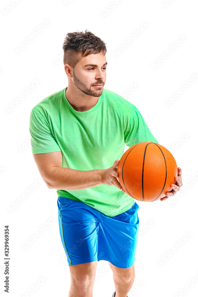 Sporty young man with ball on white background Sporty young man with ball on white background