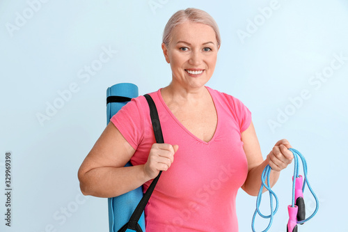 Sporty mature woman on colo...