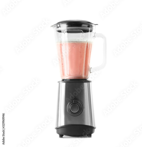 Blender with healthy smoothie on white background
