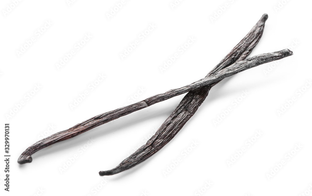 Obraz premium Aromatic vanilla sticks on white background