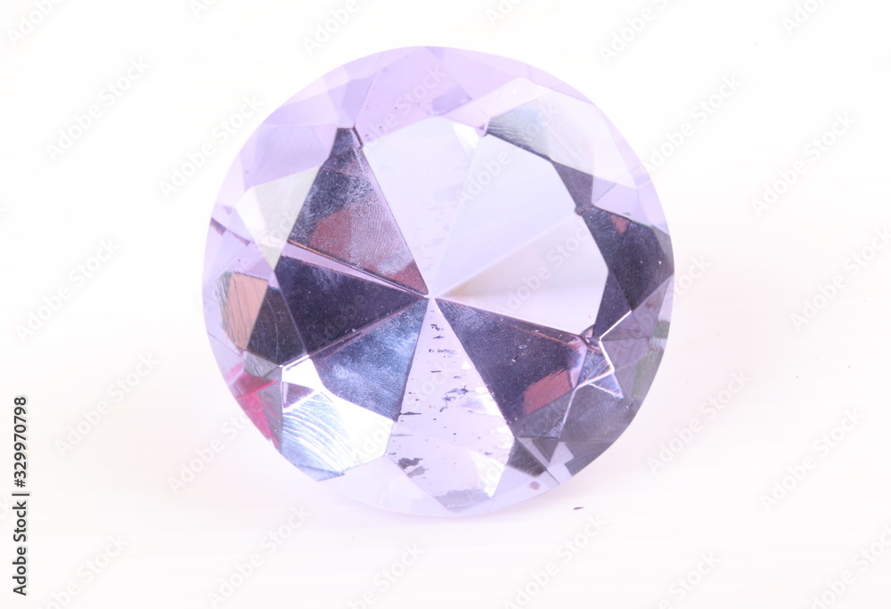 purple diamond on white surface purple diamond on white surface