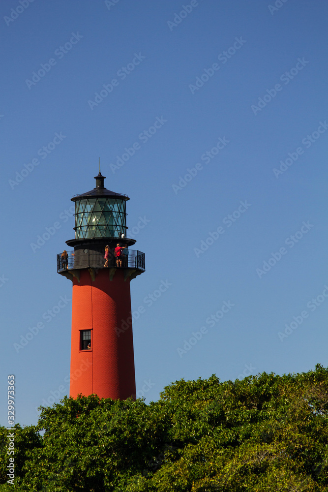 lighthouse against a blue sky