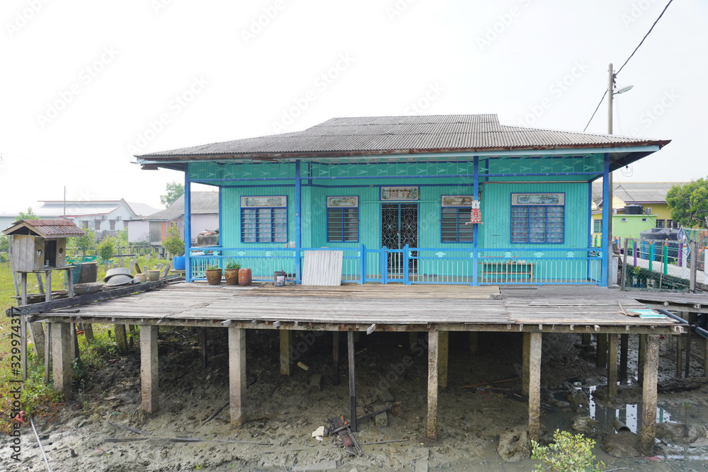 Typical new village chinese wooden house at Pulau Ketam.