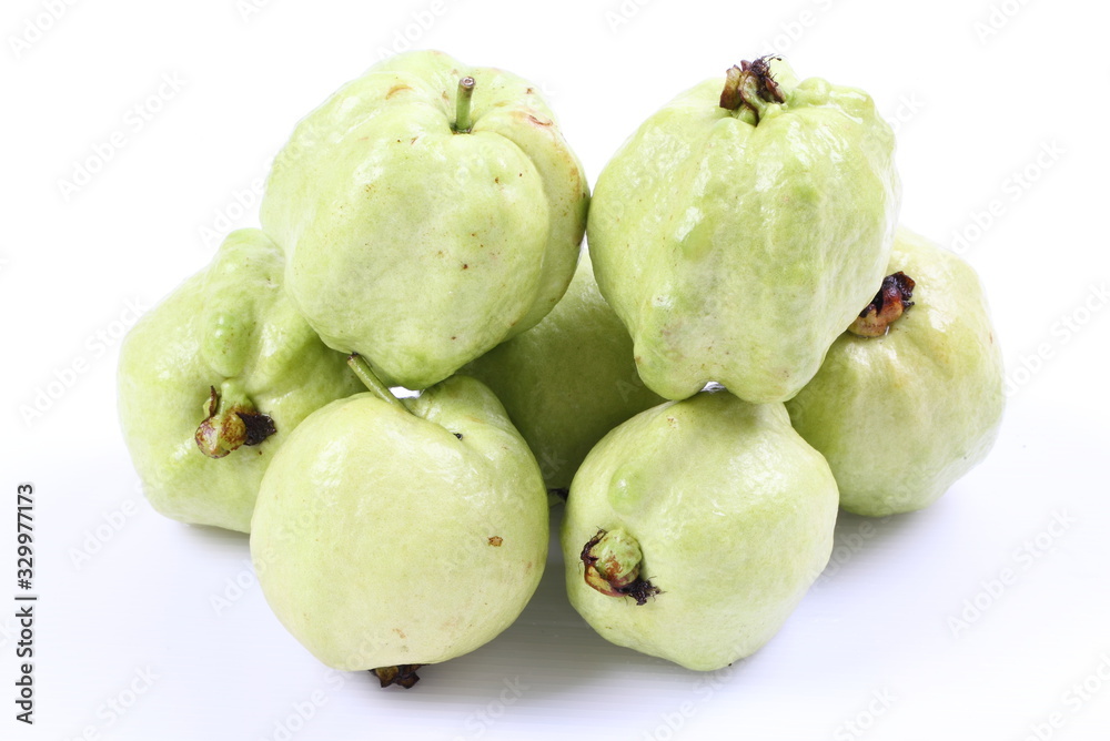 Guava (tropical fruit) on white background Guava (tropical fruit) on white background
