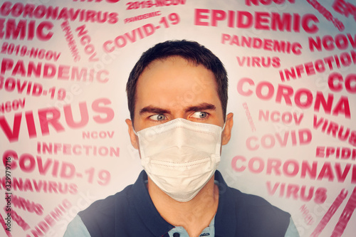man with a mask on his face, scared by the news of the coronavirus covid-2019. Panic situation. Fear of getting sick. concept of the spread of coronavirus. The patient is scared covid 19.