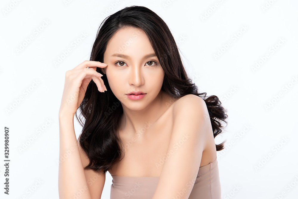 Beautiful Young Asian Woman with Clean Fresh Skin. Face care, Facial treatment, Cosmetology, beauty and healthy skin and cosmetic concept .woman beauty skin isolated on white background Beautiful Young Asian Woman with Clean Fresh Skin. Face care, Facial treatment, Cosmetology, beauty and healthy skin and cosmetic concept .woman beauty skin isolated on white background