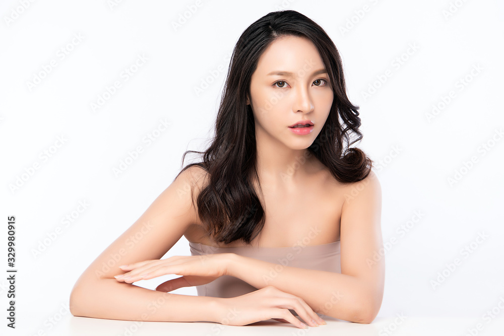 Beautiful Young Asian Woman with Clean Fresh Skin. Face care, Facial treatment, Cosmetology, beauty and healthy skin and cosmetic concept .woman beauty skin isolated on white background Beautiful Young Asian Woman with Clean Fresh Skin. Face care, Facial treatment, Cosmetology, beauty and healthy skin and cosmetic concept .woman beauty skin isolated on white background