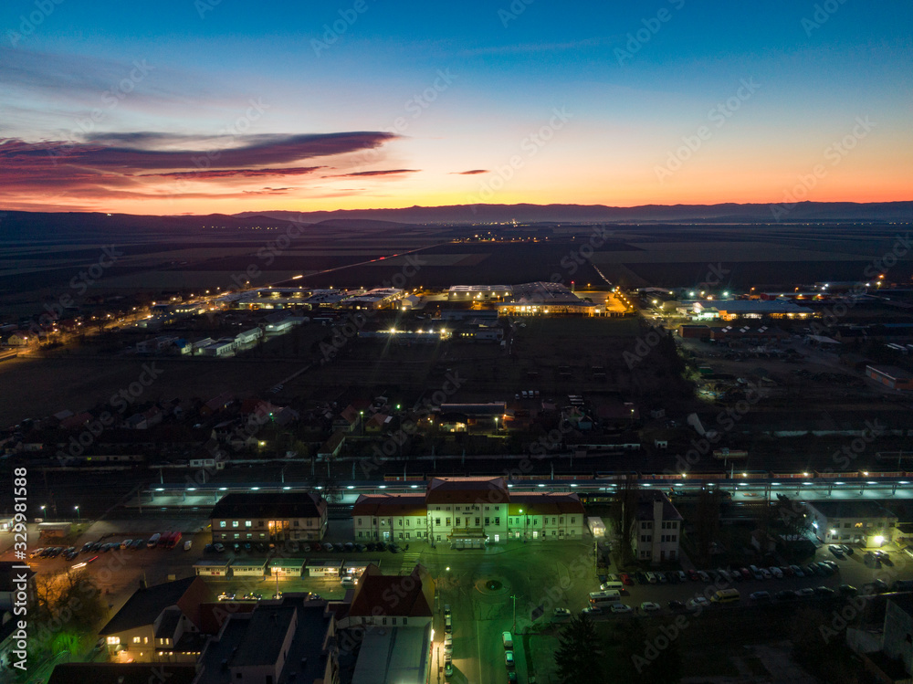 Aerial view of small city in Romania ( Sfantu Gheorghe ) at dawn 