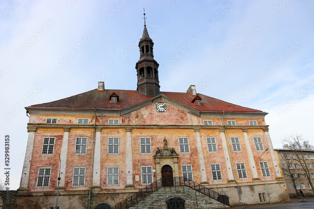 view to facade of old town hall in Narva, Estonia