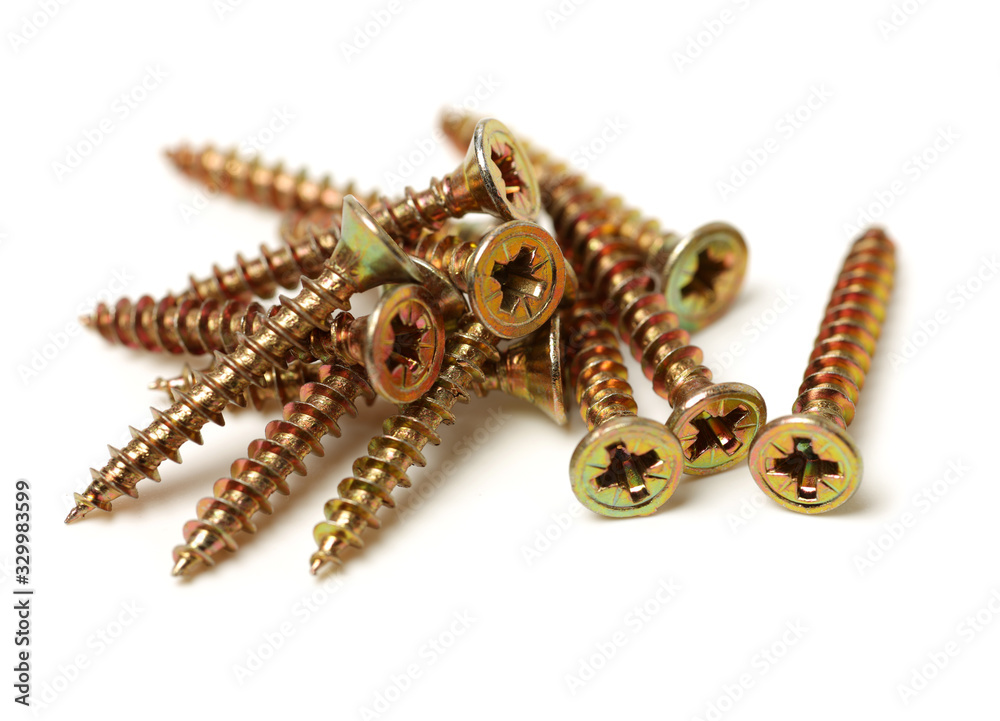 Golden screws isolated on white background Golden screws isolated on white background