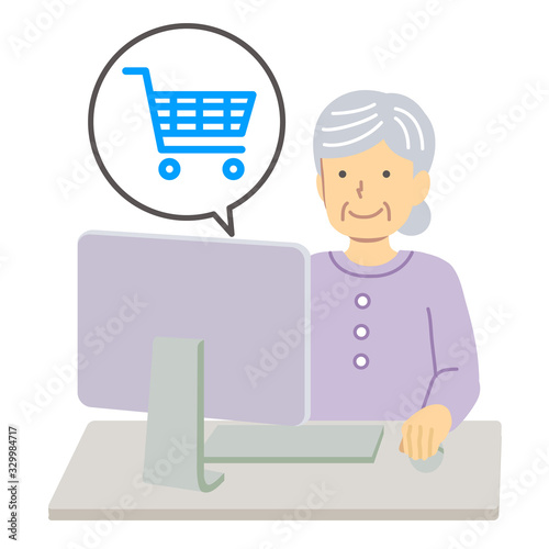 紫の服を着たシニア女性/ショッピング