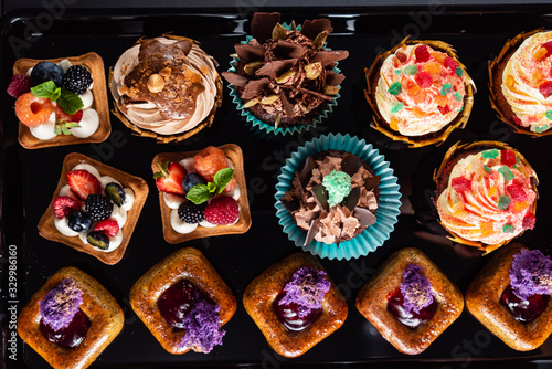 set of pastries on the black background