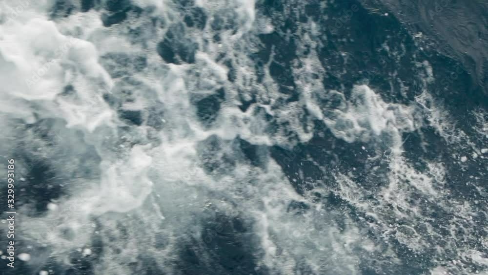 Blue sea water with boat trace. Slow motion. Blue sea water with boat trace. Slow motion.