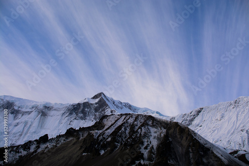 Mountains in Nepal with clouds on sky, Annapurna Circuit Trekking Route in Himalaya