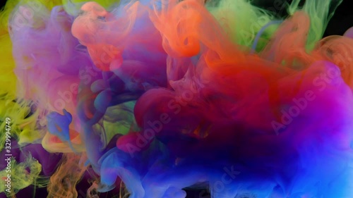 4K, Colorful paint drops mixing in water, abstract color mixing in water slow motion, drop of Ink color falling on water,  4K footage,
