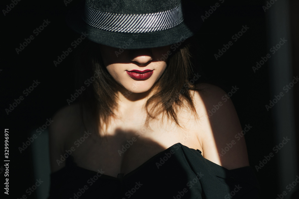 sexy young girl model in black hat with red lipstick sexy young girl model in black hat with red lipstick