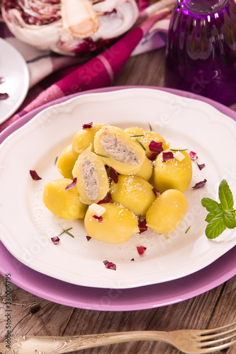 Potato gnocchi stuffed with radicchio and ricotta.