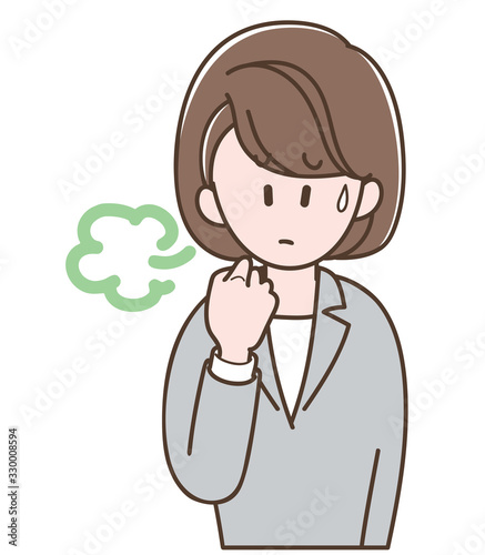 ため息をついて困るスーツの女性