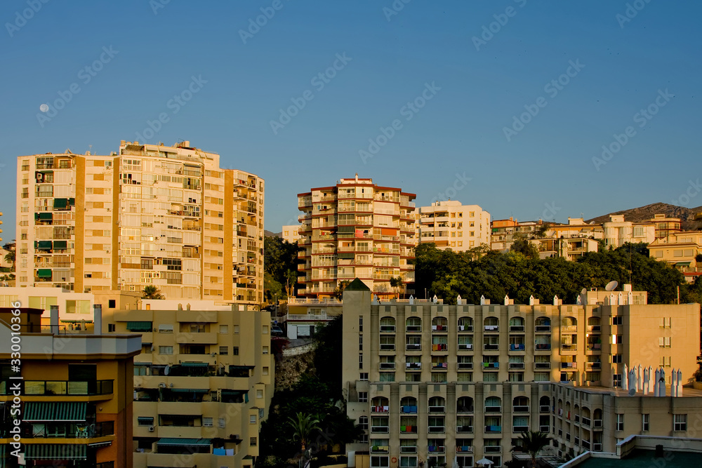 New homes stand under a blue sky New homes stand under a blue sky