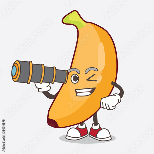 Banana Fruit cartoon mascot character using a monocular