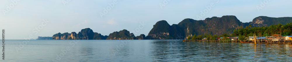 Scene of villages by the sea and mountain range at Krabi province