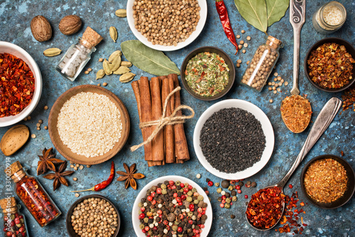 Different spices, kitchen herbs and seeds for tasty meals