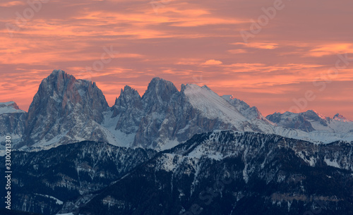 Dolomites mountain panorama in winter, sunset and twilight sky