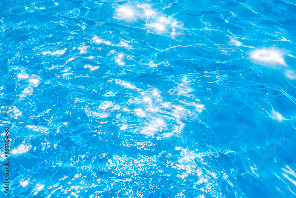 Blue and bright pool water with solar reflection, water ripple Movement and gentle wave in the pool Blue and bright pool water with solar reflection, water ripple Movement and gentle wave in the pool