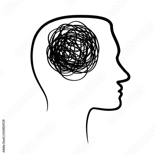 silhouette of huan head with tangled line inside, like brain. concept of chaotic thought process, confusion, personality disorder and depression photo