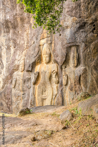 View at Three Buddha statues at Buduruvagala temple in Sri Lanka