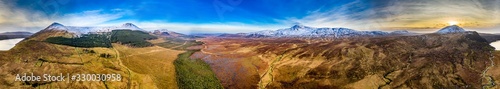 Aerial view of Mount Errigal  the highest mountain in Donegal  seen from South East with Aghla More and Aghla Beg and Derryveagh Mountains - Ireland