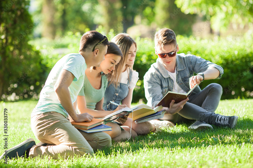 Students studying. Young people preparing for the lessons. People getting ready to the exams. Students studying. Young people preparing for the lessons. People getting ready to the exams.