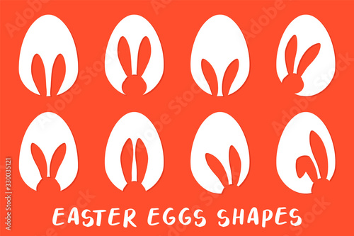 Tableau sur toile Easter eggs shapes with bunny ears silhouette - traditional symbol of holiday, big set