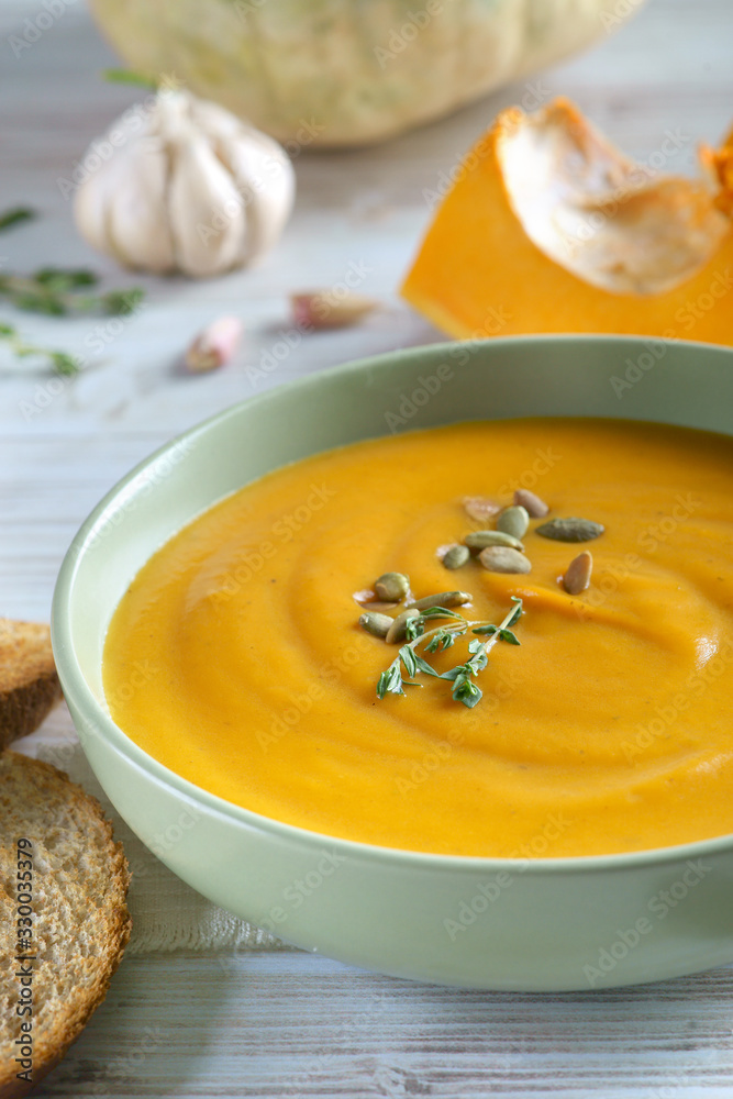pumpkin soup on a light background pumpkin soup on a light background