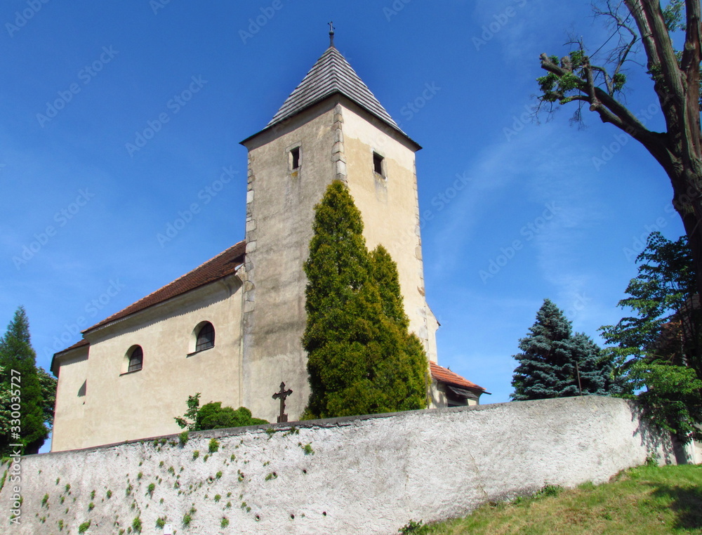 Old gothic church in village Jezov near Svihov dam, typically rural religious building Czech Republic