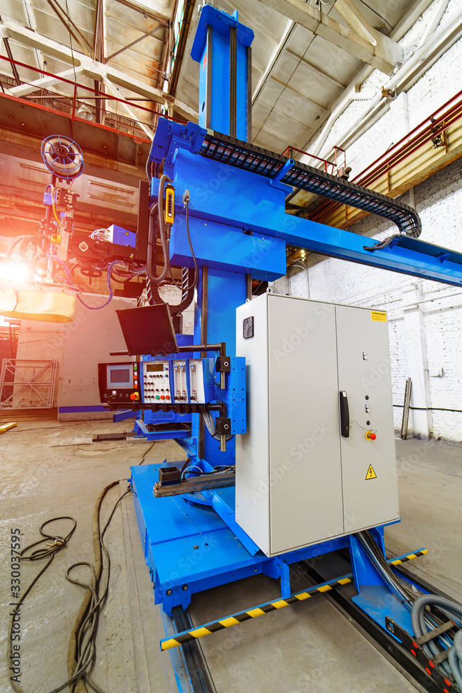 Drilling machine working process on metal factory. Industrial Laser cutting processing manufacture technology. Drilling machine working process on metal factory. Industrial Laser cutting processing manufacture technology.