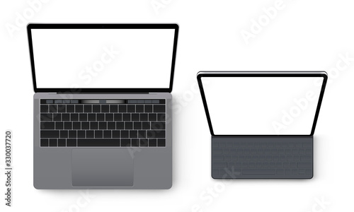 Laptop computer and tablet mockup, isolated on white background, view from above. Vector illustration