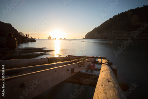 Ibiza Balearic islands Spain on June 19, 2019 Benirras beach at sunset photo