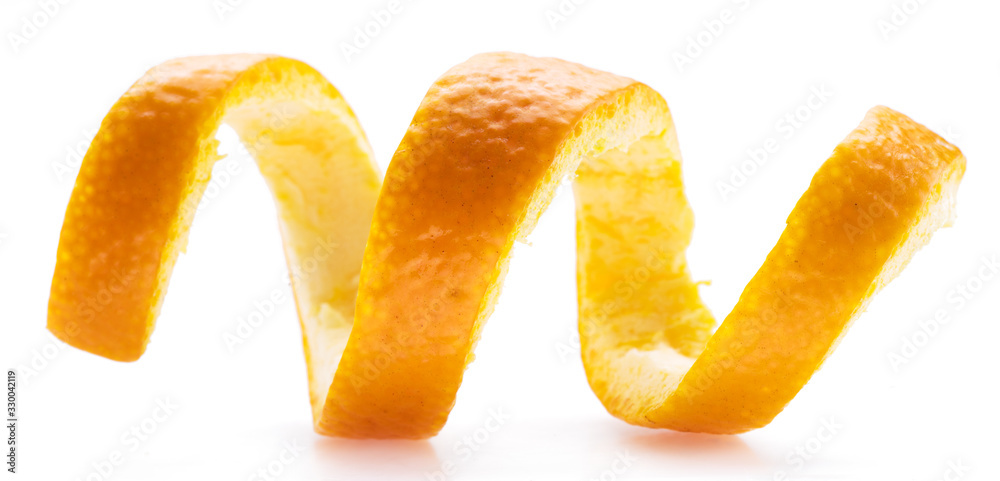Orange peel or orange twist on white background. Close-up. Orange peel or orange twist on white background. Close-up.