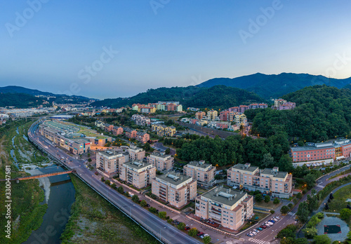 Aerial view of Genoa city townscape in summer evening, Italy