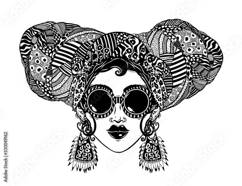 Young urban fashionable beautiful woman in cool ethnic style with elegant geometric glasses, earrings and head wrap.