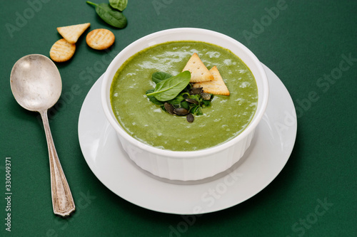 Creamy vegetable soup. Healthy spinach, broccoli vegetarian detox food.