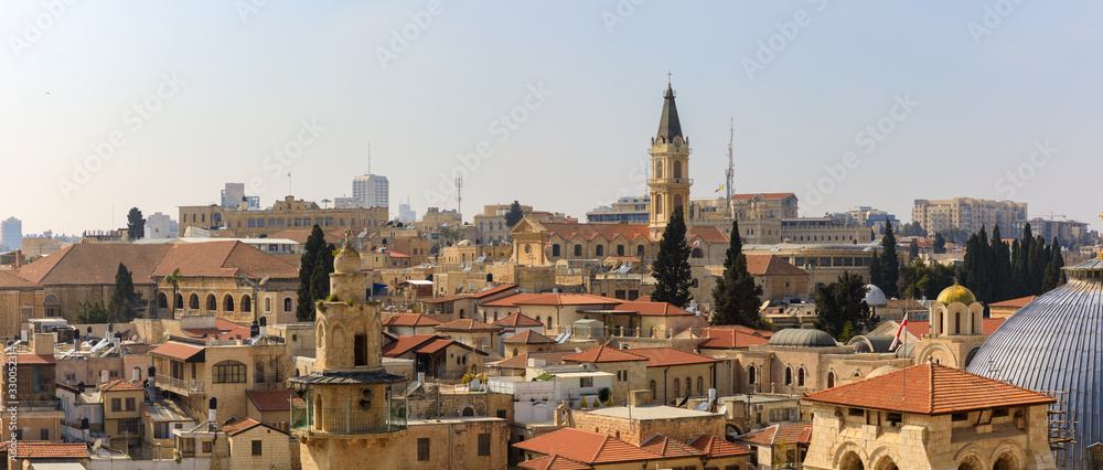 View from top of church on the panorama of old city of Jerusalem with domes of the Church of the Holy Sepulchre