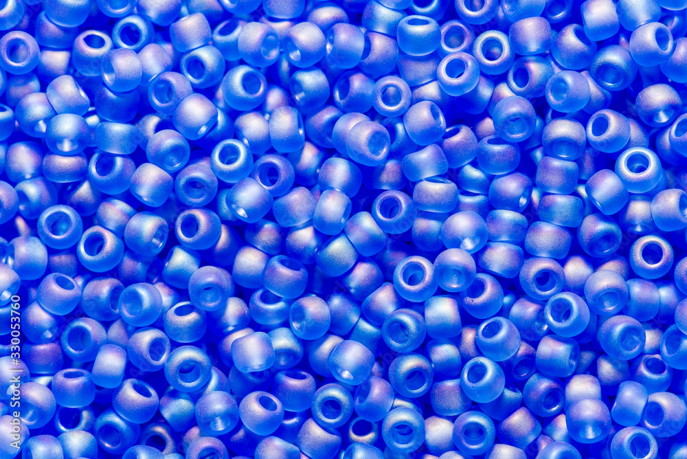 Background of baby blue glass cane beads.
