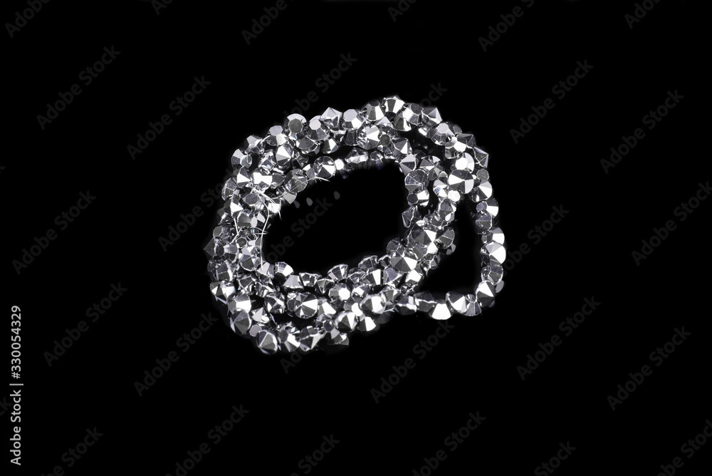 Natural stone beads on a black background isolated Natural stone beads on a black background isolated