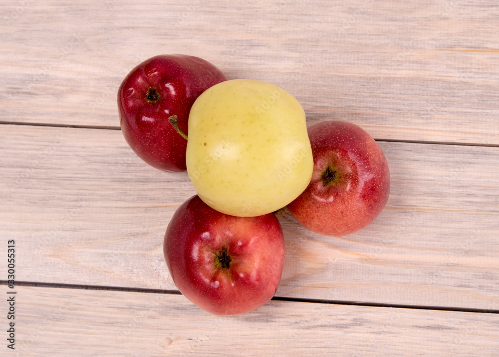 Apples karany and green on a wooden background Apples karany and green on a wooden background