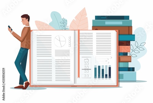 Online reading concept. Young man standing near huge books and reads book on the phone. 
