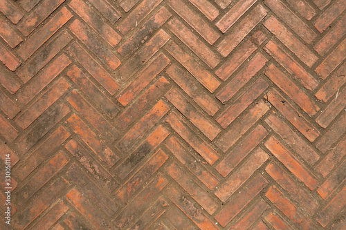 Brick wall and floor, zig zag, abstract and background, in orange brown color.