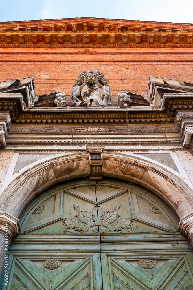 Former church of Sant'Apollonia exterior entrance partial view in Ferrara, Emilia-Romagna, Italy