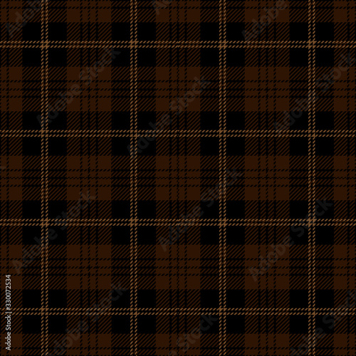 Black and brown tartan plaid. Scottish textile pattern.